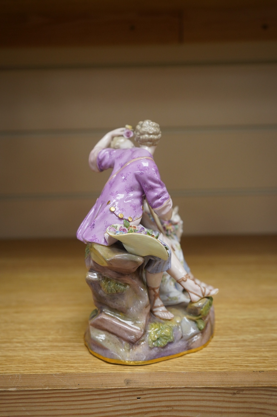 A 19th century Meissen shepherd and shepherdess group, incised to base ‘A41’, 18cm. Condition - fair, chip to base and restoration